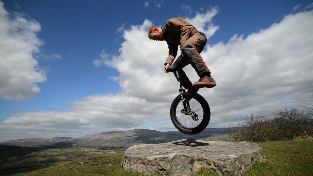 Cave Unicycling3 -M and K Garrett